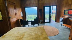 Cabaña1 con hermosa vista al valle