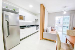 Apto de 2 dorm com suíte na praia de Palmas - 0102