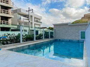 Apto de 2 dorm com suíte na praia de Palmas - 0102