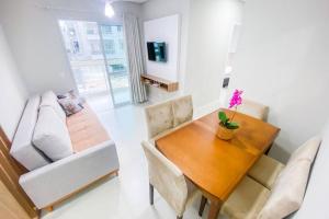 Apto de 2 dorm com suíte na praia de Palmas - 0102
