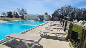 Campings Mobile-home les pieds dans l'eau : photos des chambres