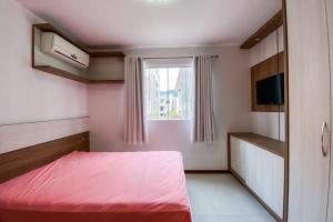 Apto 2 Dormitórios sendo 1 Suíte na Praia! - 0106