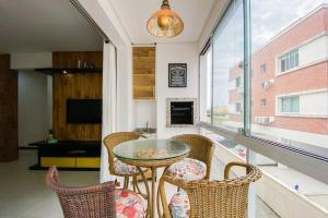 Apto 2 Dormitórios sendo 1 Suíte na Praia! - 0106