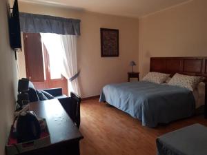 Camera Matrimoniale con Letto Supplementare