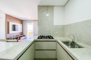 Apartamento poucos metros da praia de Palmas - 0112