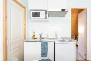 Appartements L'Oasis Studio : photos des chambres