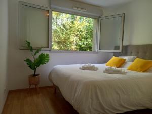Appartements T2 de 56m2 - Geneve a 5 min- Parking Prive Gratuit : photos des chambres