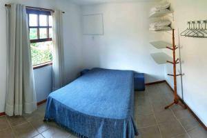 Casa em condomínio com lazer de frente para praia