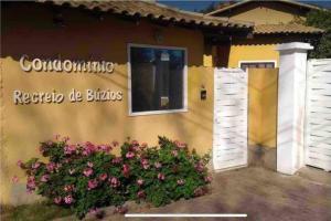 Casa em condomínio com lazer de frente para praia