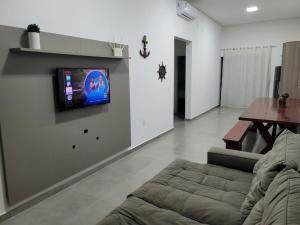 Casa com piscina e espaço gourmet 300m do mar