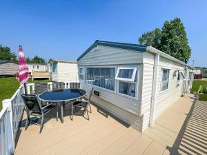 Caravan With Large Decking At Coopers Beach Holiday Park Ref 49036Ts