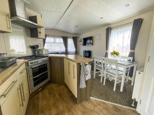 Homely 6 Berth Caravan With Decking And Wi-Fi At Seawick, Essex Ref 27928Sw