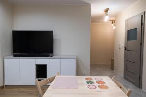Przestronny apartament w Sosnowcu, miejsce parkingowe w hali garażowej