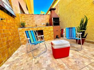 Studio pé na areia com área de churrasco privativa