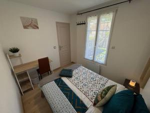 Villas R- Maison 6 chambres 3 min metro 10 lits PARC EXPO : photos des chambres