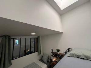 Villas R- Maison 6 chambres 3 min metro 10 lits PARC EXPO : photos des chambres