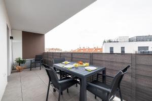 Appartements Bienvenue 2 piece clim parking : photos des chambres