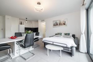 Appartements Bienvenue 2 piece clim parking : photos des chambres