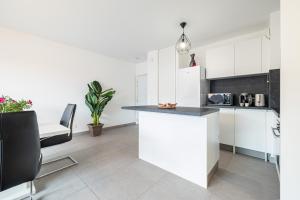 Appartements Bienvenue 2 piece clim parking : photos des chambres