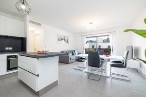 Appartements Bienvenue 2 piece clim parking : photos des chambres