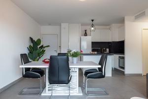 Appartements Bienvenue 2 piece clim parking : photos des chambres