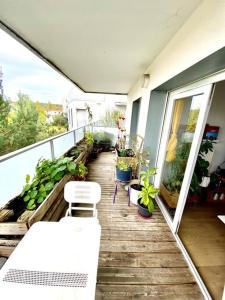 Appartements Appartement cosy - balcon - parking gratuit - 10min centre ville : photos des chambres
