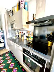 Appartements Appartement cosy - balcon - parking gratuit - 10min centre ville : photos des chambres