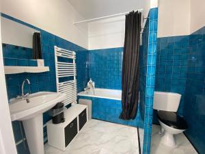 Appartements Central & Cosy : photos des chambres