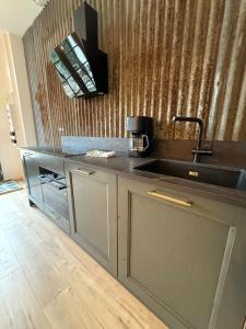 Appartements Studio Lumiere, 6 min du Zoo : photos des chambres