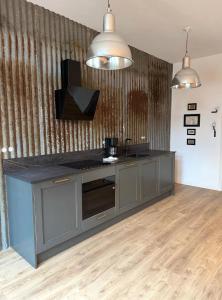 Appartements Studio Lumiere, 6 min du Zoo : photos des chambres