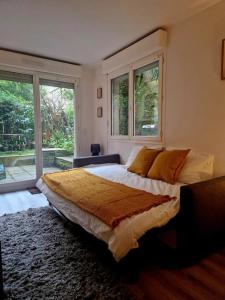 Appartements Charmant Studio au Coeur de Boulogne avec jardin : photos des chambres