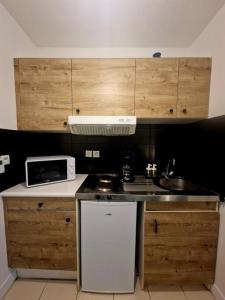 Appartements Charmant Studio au Coeur de Boulogne avec jardin : photos des chambres