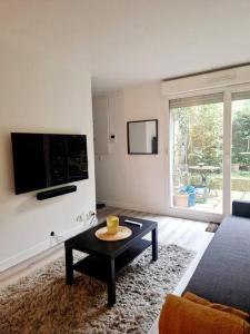 Appartements Charmant Studio au Coeur de Boulogne avec jardin : photos des chambres
