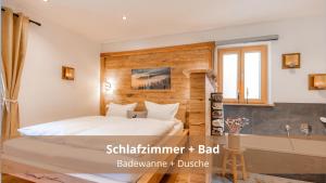 Chalet WaldHäusl luxuriöse Ferienwohnungen mit Sauna & Whirlpool, Kamin, Balkon oder Terrasse mit Bergblick