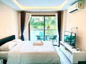 Studio in Pattaya City With Hi-Speed Wi-Fi - Not A Hotel 一卧泳池景房间 带高速网络冰箱厨房