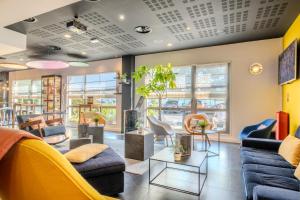 Hotels Campanile Roissy - Aeroport CDG - Le Mesnil Amelot : photos des chambres
