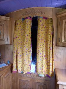 Maisons de vacances Roulotte, pleine de charme : photos des chambres