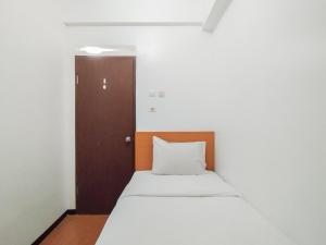 Modern 2BR at Apartment Suites @Metro By Travelio