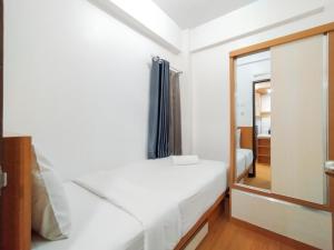 Modern 2BR at Apartment Suites @Metro By Travelio
