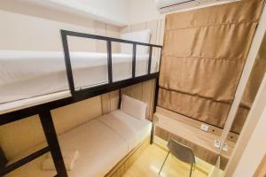 Spacious and Homey 2BR at Sky House BSD Apartment By Travelio