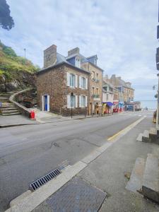 Appartements La MerVeille by MRODBNB - Appart Neuf - Apercu Mer - 25m Plage & Resto - Cine - cheminee - Popcorn : photos des chambres