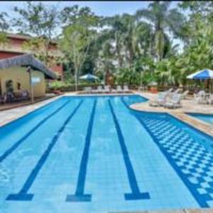 Flat Amarilis Riviera de São Lourenço Apartamento Duplex inteiro, 3 piscinas climatizadas, carregador veiculo elétrico, cozinha equipada completa, serviço de praia final semana, limpeza e enxoval completo com trocas diárias de toalhas