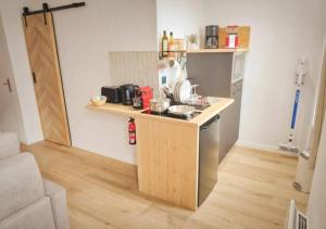 Appartements La MerVeille by MRODBNB - Appart Neuf - Apercu Mer - 25m Plage & Resto - Cine - cheminee - Popcorn : photos des chambres