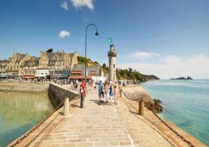 Appartements L'Etoile by MRODBNB - Appart Neuf - Vue Mer - 25m Plage & Resto - Cine - cheminee - Popcorn : photos des chambres