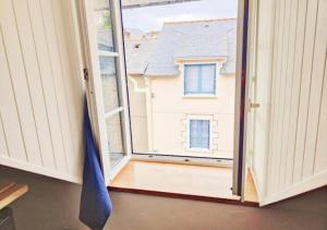 Appartements L'Etoile by MRODBNB - Appart Neuf - Vue Mer - 25m Plage & Resto - Cine - cheminee - Popcorn : photos des chambres