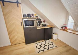 Appartements L'Etoile by MRODBNB - Appart Neuf - Vue Mer - 25m Plage & Resto - Cine - cheminee - Popcorn : photos des chambres