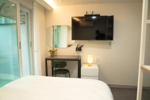 Phòng Deluxe Đơn có ban công (Deluxe Single Room with Balcony)