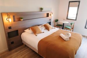 Appart'hotels Appart-hotel Le Corot - Acces Autonome - Saint-Junien Centre : photos des chambres