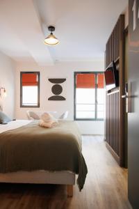 Appart'hotels Appart-hotel Le Corot - Acces Autonome - Saint-Junien Centre : photos des chambres