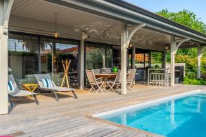 Villas Superbe maison climatisee avec piscine : photos des chambres